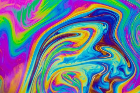 Psychedelic multicolored patterns background. Photo macro shot of soap bubble Stock Photos
