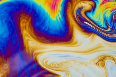 Psychedelic multicolored patterns background. Photo macro shot of soap bubble Stock Photos