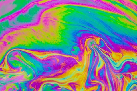 Psychedelic multicolored patterns background. Photo macro shot of soap bubble Stock Photos