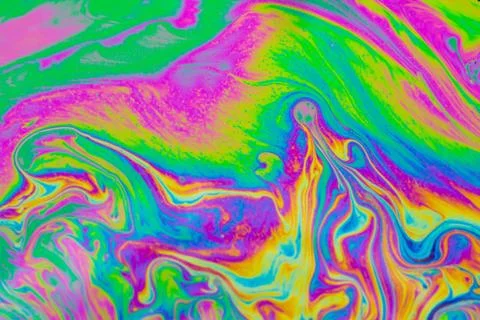 Psychedelic multicolored patterns background. Photo macro shot of soap bubble Stock Photos