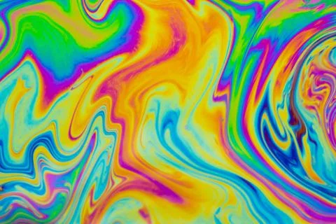 Psychedelic multicolored patterns background. Photo macro shot of soap bubble Stock Photos