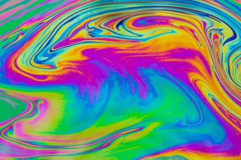 Psychedelic multicolored patterns background. Photo macro shot of soap bubble Stock Photos