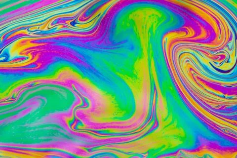 Psychedelic multicolored patterns background. Photo macro shot of soap bubble Stock Photos