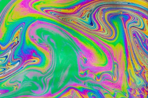 Psychedelic multicolored patterns background. Photo macro shot of soap bubble Stock Photos