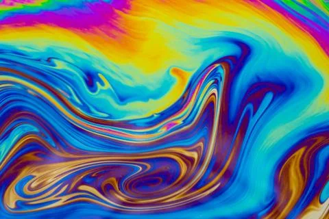 Psychedelic multicolored patterns background. Photo macro shot of soap bubble Stock Photos