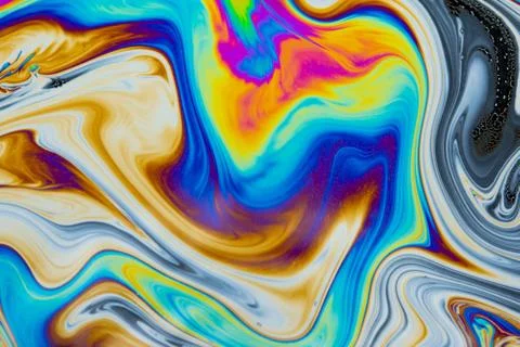 Psychedelic multicolored patterns background. Photo macro shot of soap bubble Stock Photos
