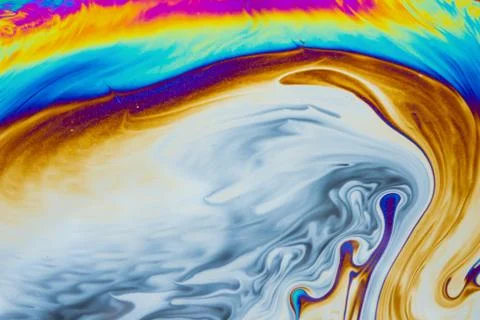 Psychedelic multicolored patterns background. Photo macro shot of soap bubble Stock Photos
