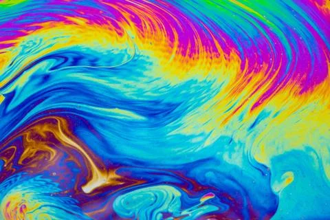 Psychedelic multicolored patterns background. Photo macro shot of soap bubble Stock Photos