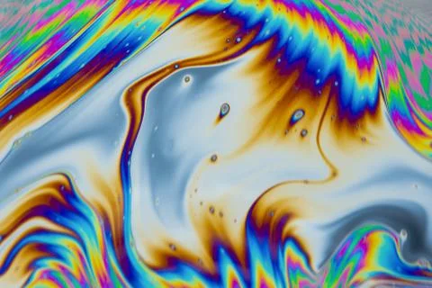 Psychedelic multicolored patterns background. Photo macro shot of soap bubble Stock Photos
