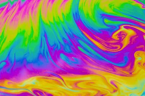 Psychedelic multicolored patterns background. Photo macro shot of soap bubble Stock Photos