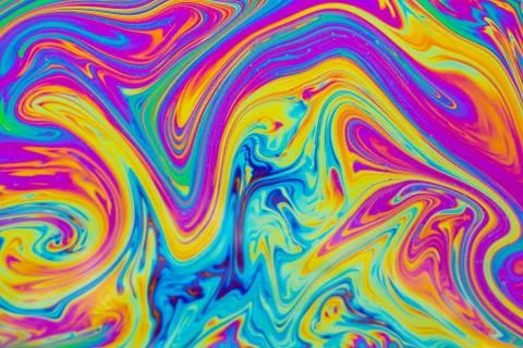 Psychedelic multicolored patterns background. Photo macro shot of soap bubble Stock Photos
