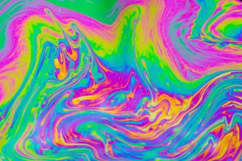 Psychedelic multicolored patterns background. Photo macro shot of soap bubble Stock Photos