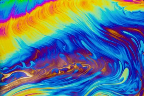 Psychedelic multicolored patterns background. Photo macro shot of soap bubble Stock Photos