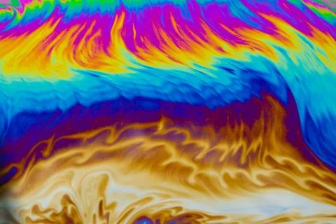 Psychedelic multicolored patterns background. Photo macro shot of soap bubble Stock Photos