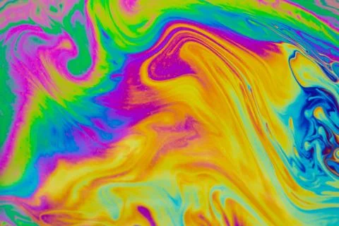 Psychedelic multicolored patterns background. Photo macro shot of soap bubble Stock Photos