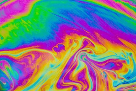 Psychedelic multicolored patterns background. Photo macro shot of soap bubble Stock Photos