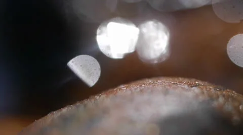 Psychedelic Nature Shimmering Waves Splash Behind Rock Stock Footage 25896802