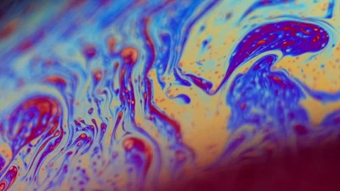 Psychedelic paint blur ink mix blue orange dye Stock Footage 287270729