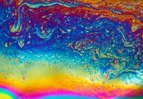 Psychedelic patterns formed on the surface of soap bubbles Stock Photos