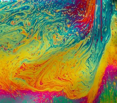 Psychedelic patterns formed on the surface of soap bubbles Stock Photos