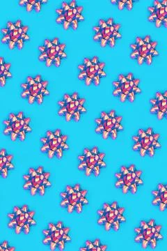 Psychedelic Ribbon Bow Pattern on Pastel Blue Stock Photos