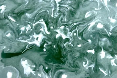 Psychedelic texture of an old green and white handcrafted brick Foto stock