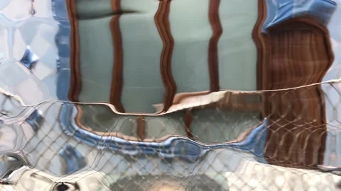 Psychedelic window inside a building. Psychedelia in blue and brown colors. Vídeos de archivo 140950477