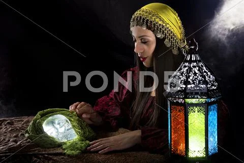 Psychic Holding a Crystal Skull Stock Photos