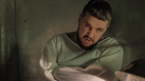 Psycho, crazy man in a straitjacket in a psychiatric hospital, creepy Stock-Footage 126000654