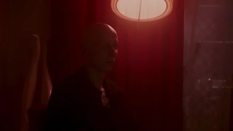 Psycho man in a dark room Video stock 259852192