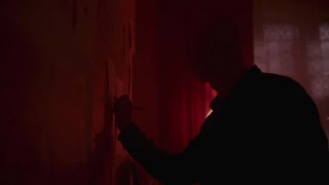 Psycho man writing on the Wall Stock-Footage 259850965