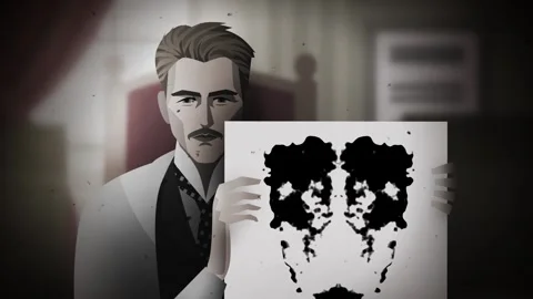 Psychologist presenting rorschach inkblot test Stock Footage 327174526