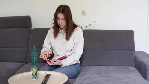 Psychologist reviewing therapy notes 스톡 동영상 335717363