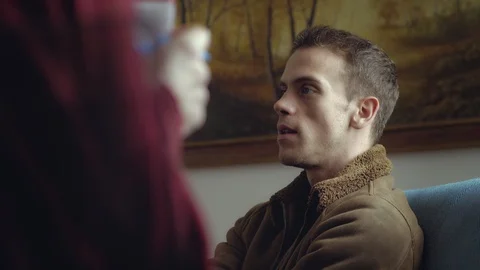 Psychologist taking notes during therapy session with her patient. Video stock 103516961