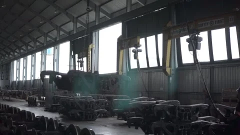 PT Kereta Api Indonesia facilities officer is moving the train wheel boogie Stock Footage 263477377