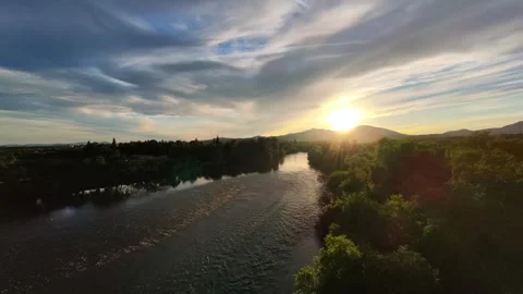 PT2-SUNSET-SUN DIAL BRIDGE-SACRAMENTO RIVER-AERIAL 360-RISING,TURN TO SUNSET 8PT 스톡 동영상 332011123