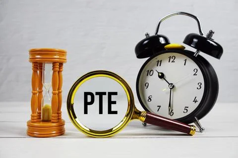 PTE abbreviation of Part time Equivalent text with alarm clock on wooden ba.. Stock Photos