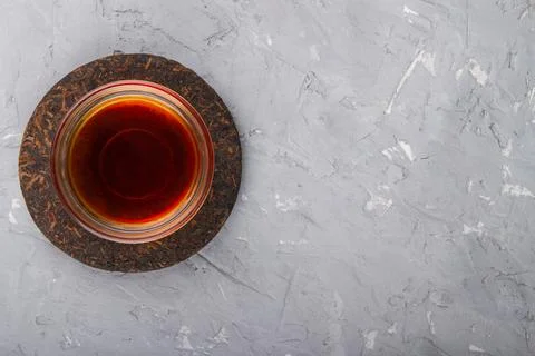 Pu erh tea on plaster Stock Photos