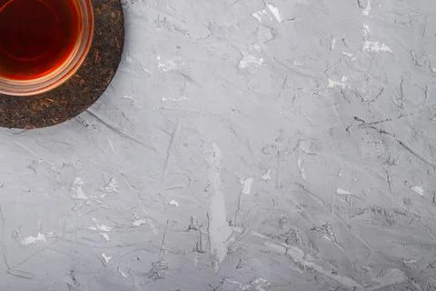 Pu erh tea on plaster Stock Photos