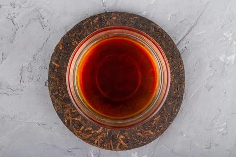 Pu erh tea on plaster Stock Photos