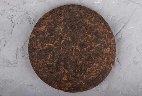 Pu erh tea on plaster Stock Photos