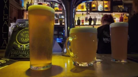 Pub, cutaway drinks on bar. British culture, evening. York.UK 3.9.2026 Stock Footage 346725353