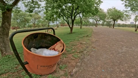 Public Baskit Bin in Park - UHD Slow Mo 動画素材 245686424