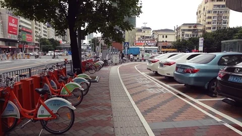 Public bicycle sharing system - Shenzhen, Guangdong, China Stock Footage 79911849