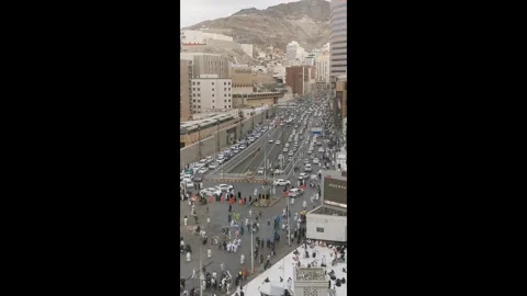 Public cab queue up looking for passengers outside Haram Mosque in Makkah, Stock Footage 274459546