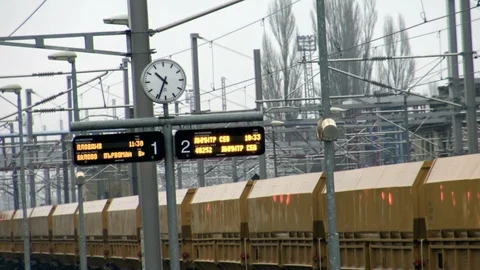 Public clock In a railway station Stock Footage 101174593