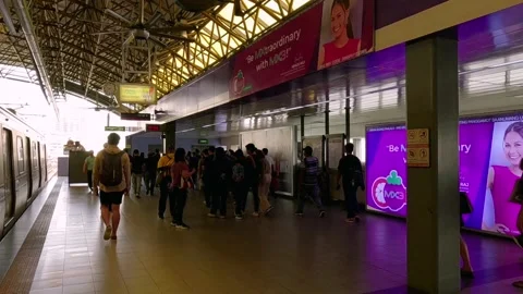 Public Commuters Passing the Platform of LRT Recto Avenue Train Station Stock Footage 236181770