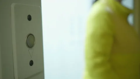 Public elevator in the entrance of the house, elevator call button Stock Footage 131864537