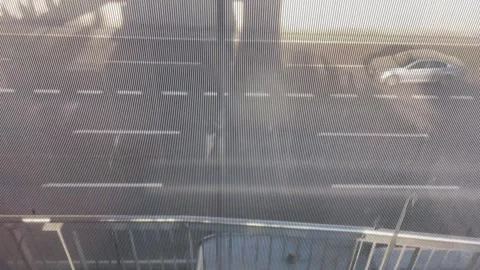 Public elevator going down near a busy road Stock Footage 297481847