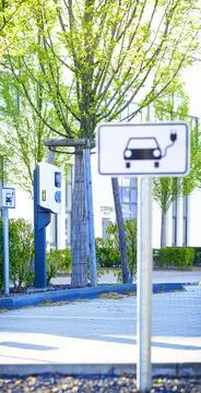 Public EV charge point and parking station with free spaces Фото